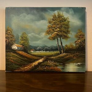 Small landscape painting signed